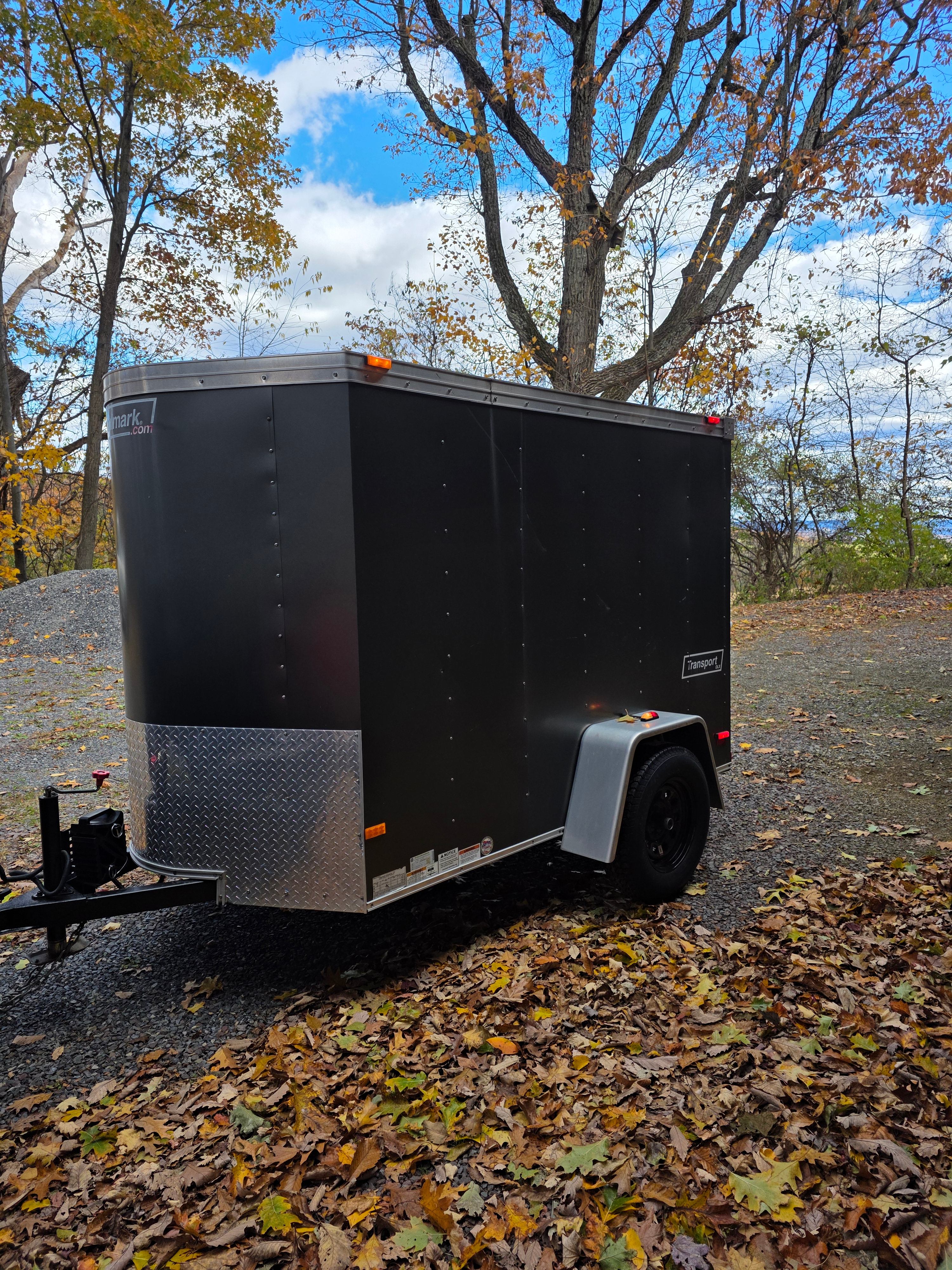 5x8 enclosed cargo trailer exterior with swing door and weather-tight seal